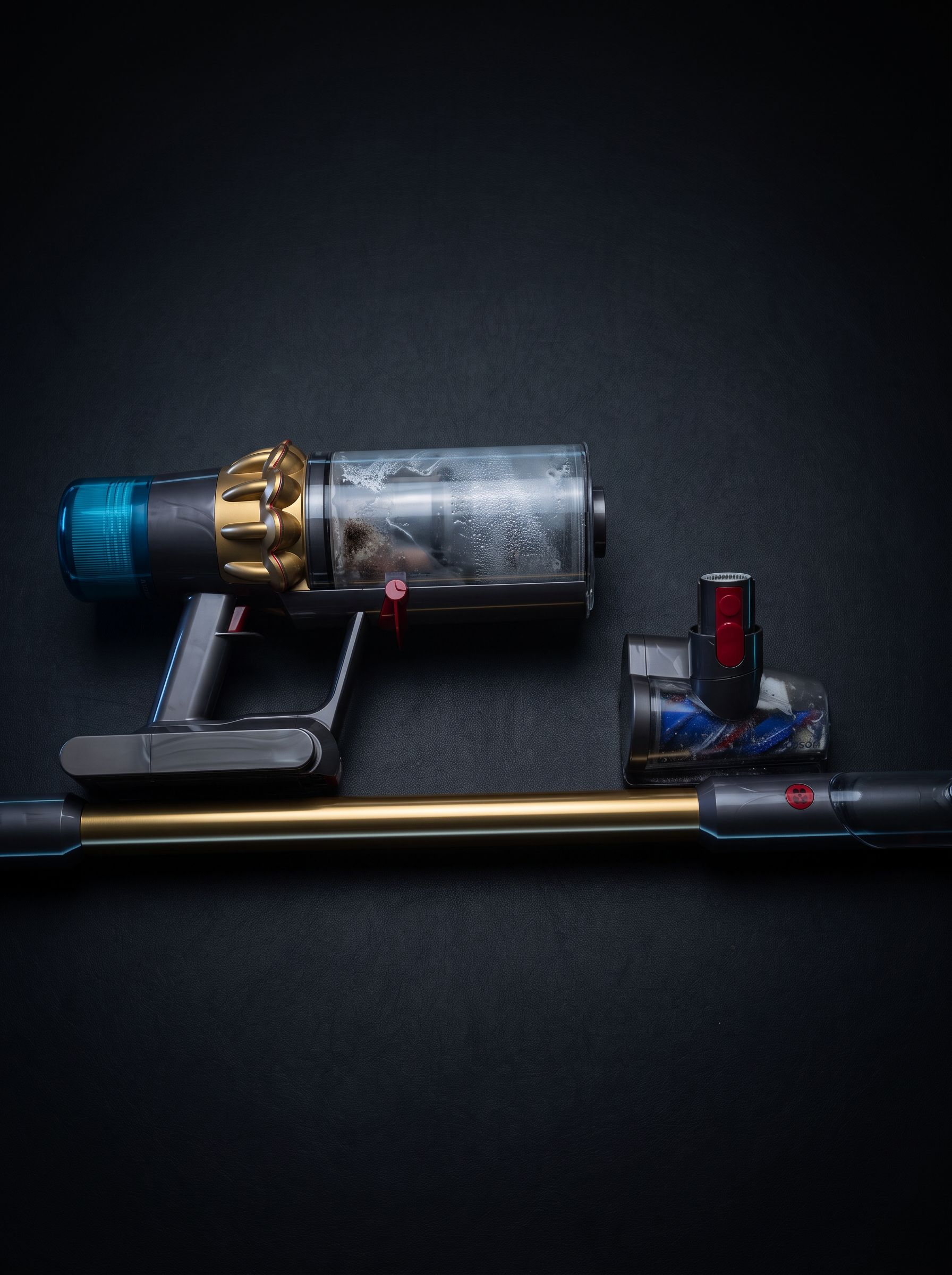 Technician repairing a disassembled Dyson cordless vacuum on a workshop bench